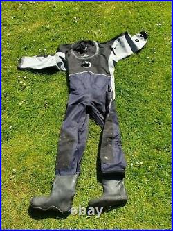 Complete Scuba Kit! Featuring dry suit, bear suit, BCD, regulators, comp. Etc